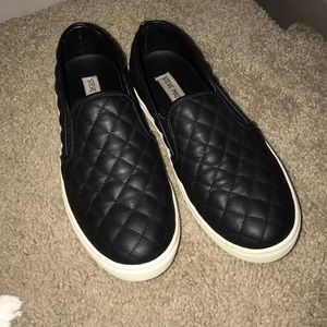 Very clean black Steve Madden slip ons!